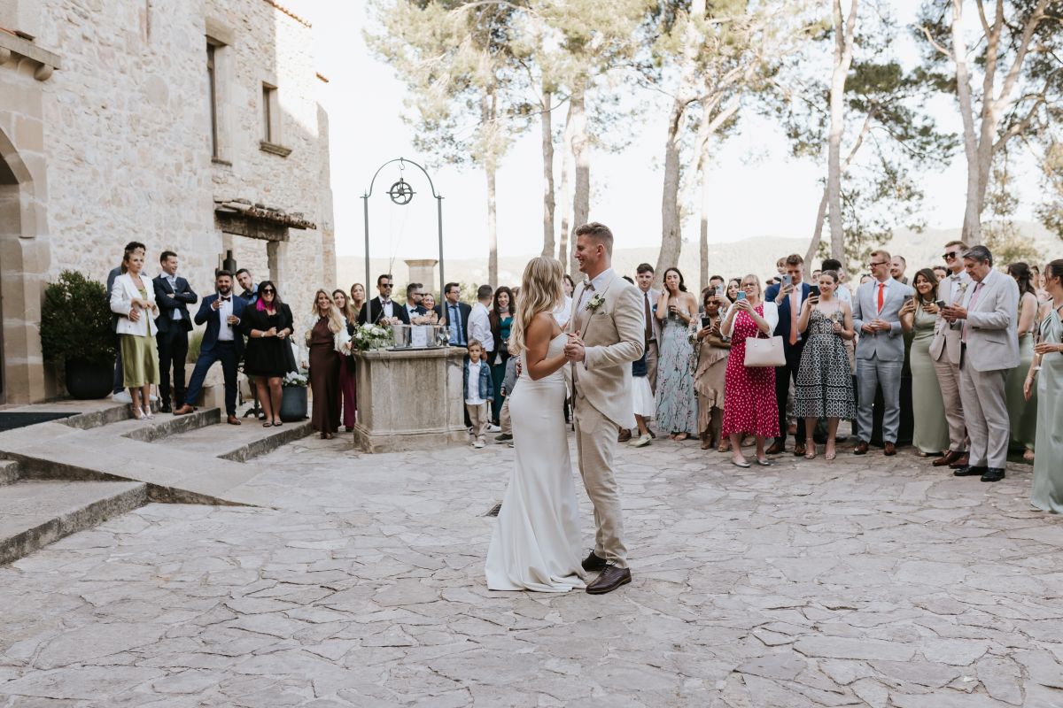 couple first dance with guests